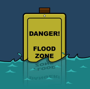 Danger flood zone signage slowly getting sink in the water caused by the flood.