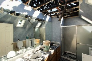 Damaged ceilings in the bathroom caused by the fire.